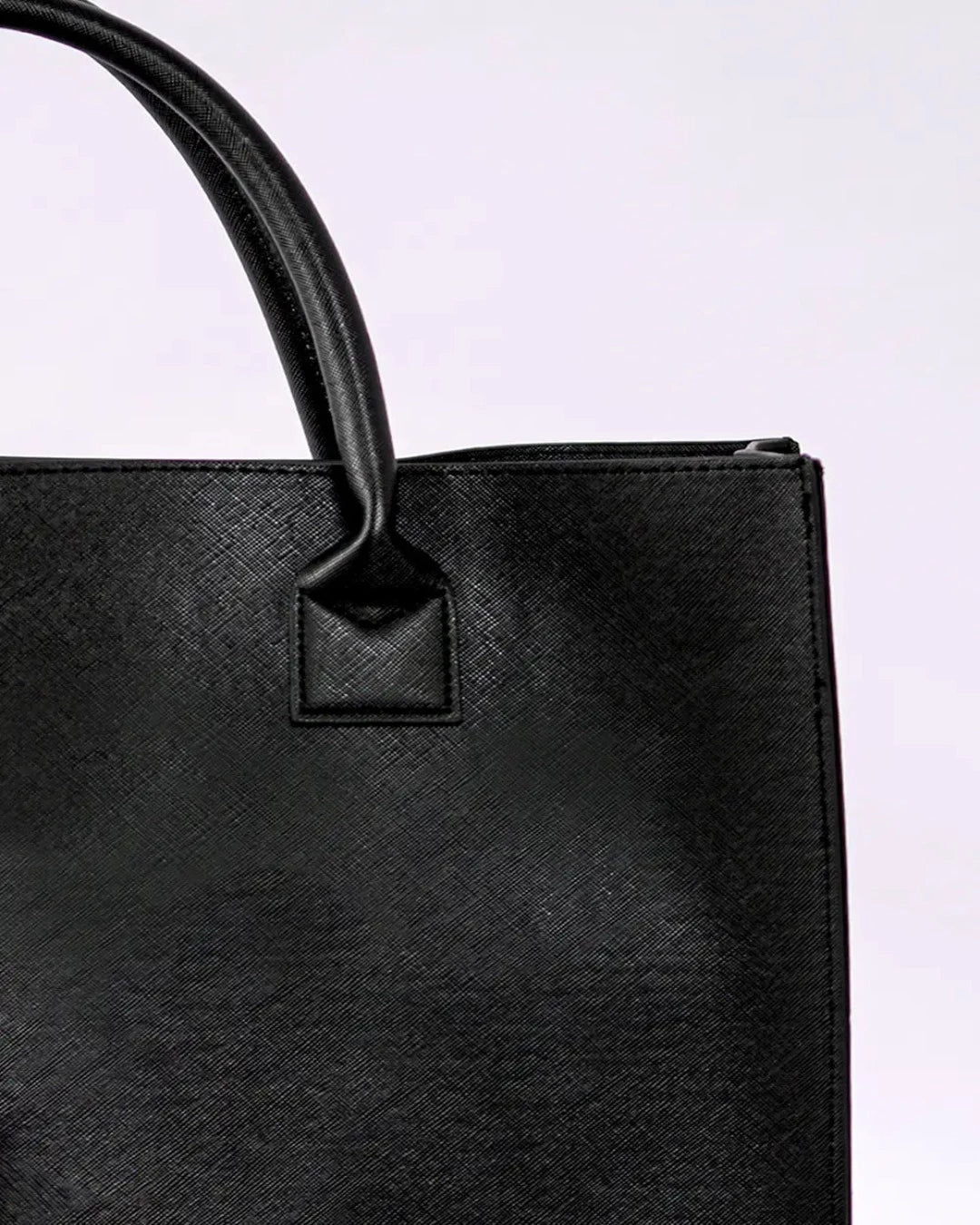 Vegan Leather Tote great for all occasions. This Boss Lady Tote has an additional pocket inside and comes in tan or black.