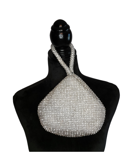 This will be the perfect accessory to pull your outfit together.  Silver, beaded, triangle shaped purse, top zip closure, with loop handle.  Style in any season.  Great for prom night, date night or weddings.  Dimensions 7.5"L X 5"W X 4.5"D